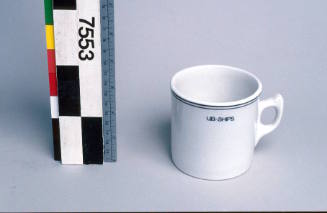 Ceramic cup from SS MOBIL AUSTRALIS with house flag from Bulk Ships Pty Ltd.