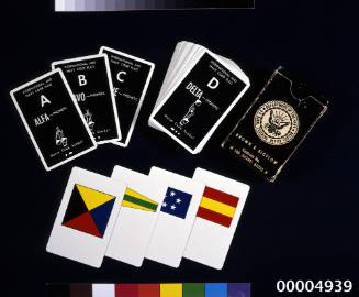 PACK OF US NAVY ISSUED SIGNAL CARDS FEATURING COLOURED ILLUSTRATIONS OF FLAGS, CARDS ARE PACKED IN A BLACK CARDBOARD BOX