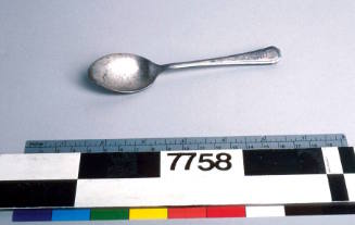 Metal teaspoon from Adelaide Steamship Company.