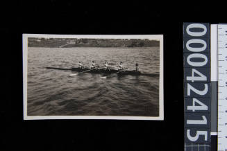 YWCA Women's rowing team. Female coxswain