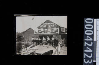 YWCA Women's Rowing Team outside Gardner's Boat Shed preparing to row