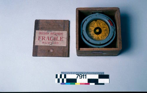 Wooden box with lifeboat compass