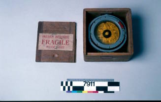Wooden box with lifeboat compass