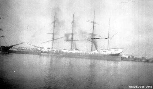 Four masted barque alongside wharf