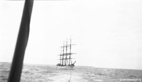 Four masted barque under tow