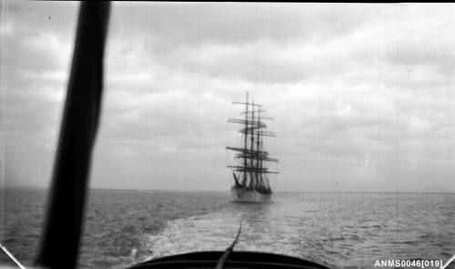 Four masted barque under tow