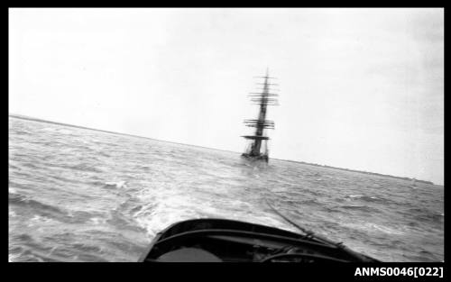 Four masted barque under tow