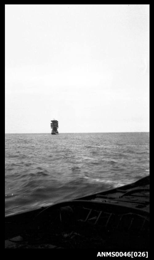 Distant stern view of large sailing ship