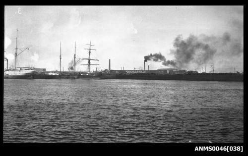 Three masted barquentine alongside wharf