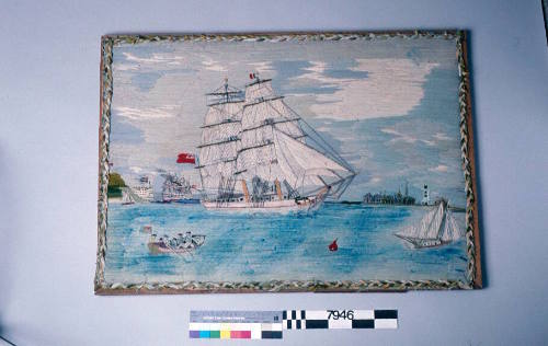 Woolwork picture of a harbour scene