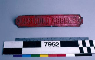 Red metal sign with inscription from ATLANTIC COUNTESS.

