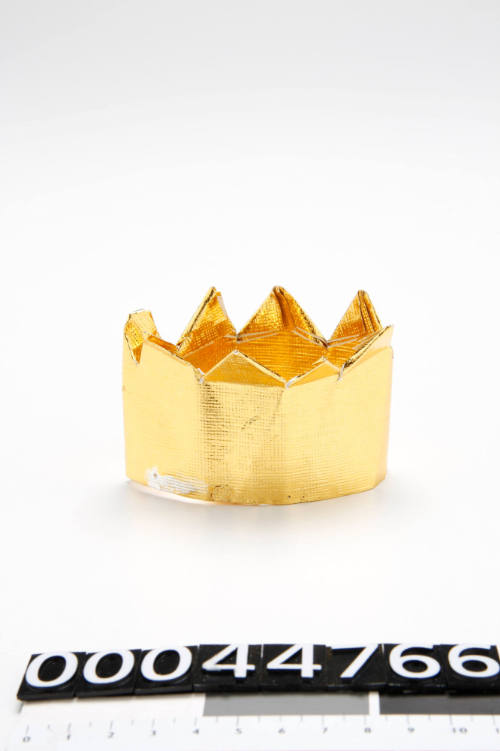 Paper crown prop used by Lois Carrington