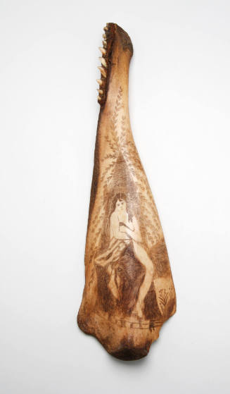 Woman's paritally nude portrait on a toothed whale's jawbone