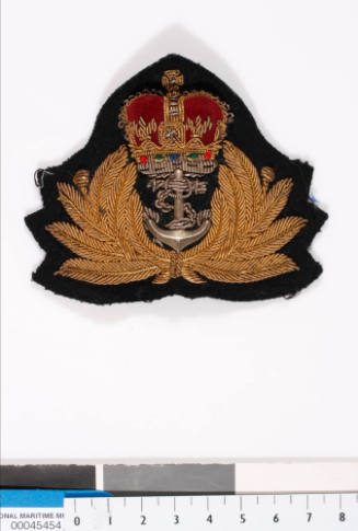 Cap badge from Royal Australian Naval uniforms of Commander Robert James Varley