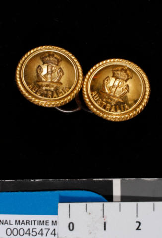 Two attached buttons from Royal Australian Naval uniforms of Commander Robert James Varley