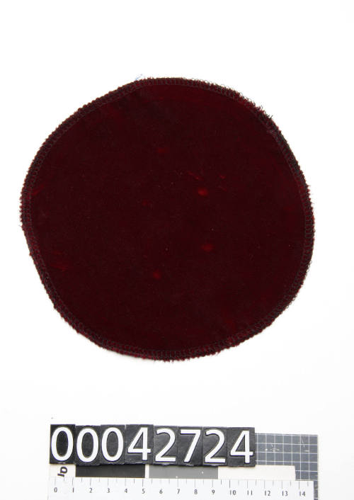 Maroon protective velvet cover for pearl shell