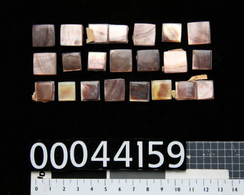 Twenty pieces of trimmed and polished pearl shell, of brown and pink colouring, cut into the shape of a square