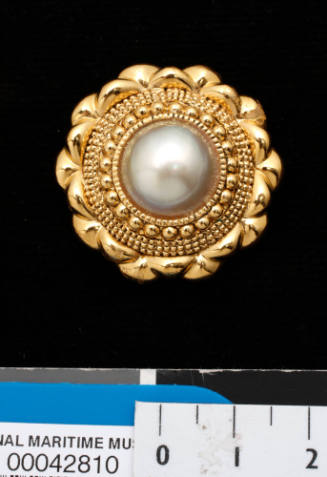 Gold metal and cultured half pearl (or mabe pearl) earring