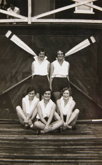 Crew of YWCA Four outside Gardner's boatshed, Sydney