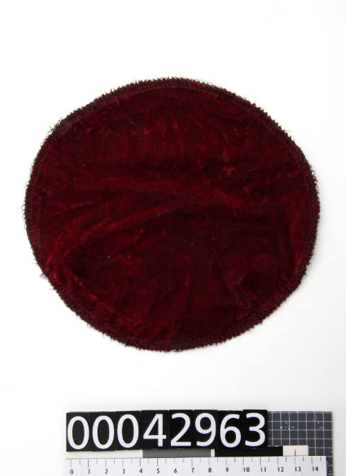 Maroon protective velvet cover for plastic nuclei