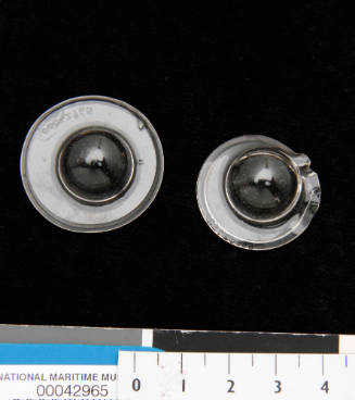 Two clear plastic nuclei with wide bases