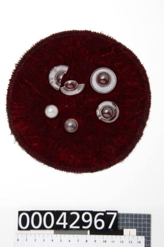Maroon protective velvet cover for plastic nuclei