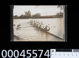 Coxed eight crew from Tasmania with white Maltese crosses on their uniforms