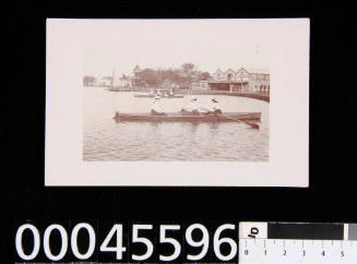 Postcard of three women rowing on Albert Park Lake