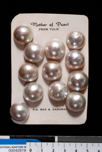 Twelve cultured half pearls (or mabe pearls) with shell bases