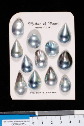 Twelve cultured blister pearls with shell bases
