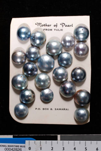 Twenty-one grey cultured half pearls (or mabe pearls) with shell bases