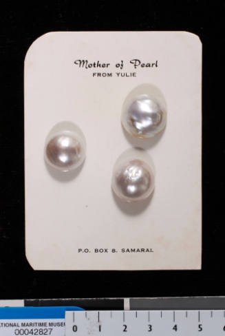 Cultured half-pearls