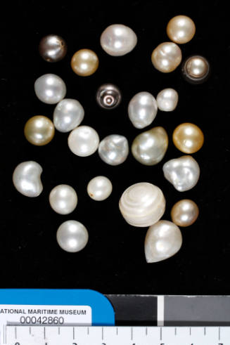 Twenty-four cultured pearls of assorted shapes and colours