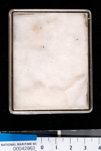 White and clear plastic box, with padding