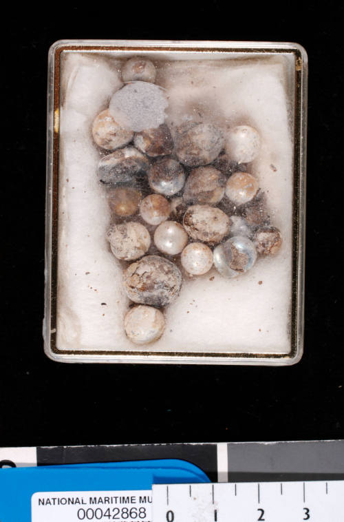 Twenty-two failed cultured pearls