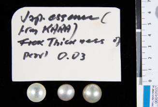 Four cultured half pearls (or mabe pearls), two have nuclei and glue, the others are hollow
