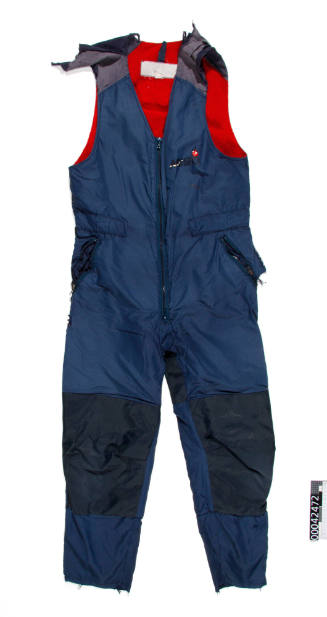Pair of navy Musto brand middle layer salopettes worn on board BERRIMILLA II