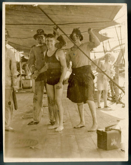 Crossing the Line ceremony aboard HMAS MELBOURNE (Note this image contains offensive depictions of First Peoples and may cause trauma for people whose identities are directly impacted)