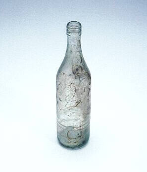 Glass bottle for fish sauce, similar to those taken on TU DO