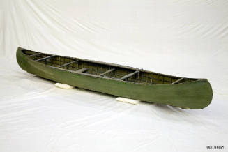 Three person canvas canoe called the POD