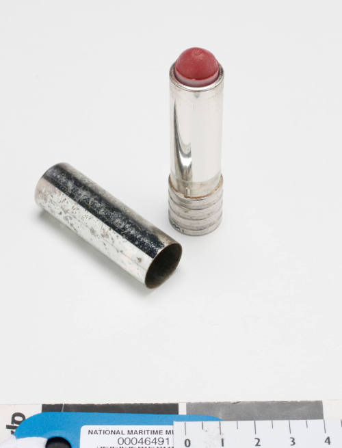 Pink lipstick in silver canister