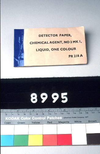 DETECTOR PAPER, CHEMICAL AGENT, NO 2, MK 1, LIQUID, ONE COLOUR, PR 218A, CONTAINS PIECES OF WAXED PAPER AND SHEETS OF GREEN PAPER WITH ADHESIVE BACKING SHEETS, SHEETS ARE PERFORATED
