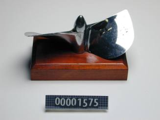 Propeller from Ken Frances speedboat MARLO mounted on a wooden block