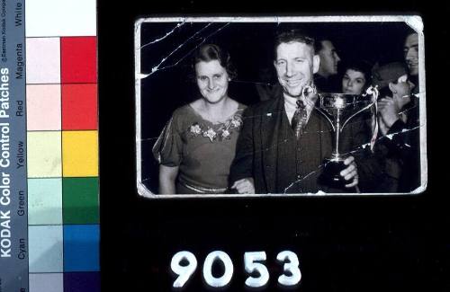 Mick Walsh holding the Rob Roy Cup with his wife Linda beside him