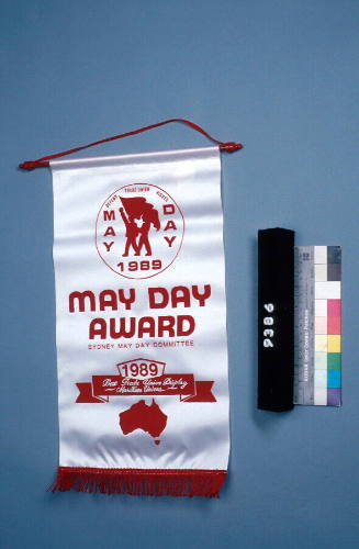 Miniature banner featuring text reading Defend trade union rights May Day 1989