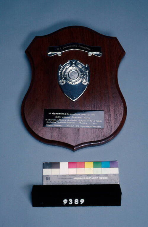 Plaque engraved with presented in appreciation of the assistance given by the Terry Gorden Memorial fund in sending a Western Australian deleglate to the 12th world festival of youth and students, Moscow - 1985