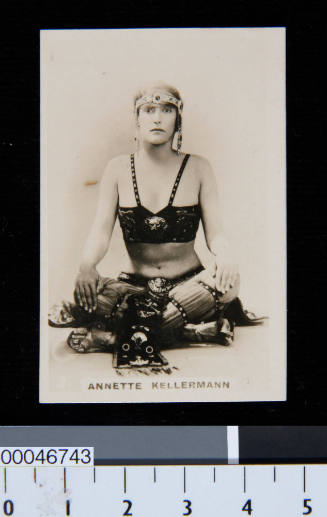 Cigarette card with photograph of Annette Kellerman in costume from the film A Daughter of the …
