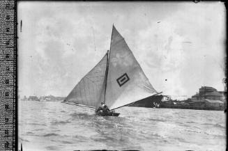 12-foot skiff MEMORY sailing on Sydney Harbour