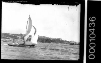21-foot restricted class yacht C10 sailing on Sydney Harbour near Rose Bay