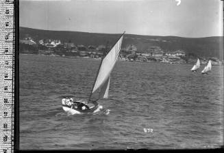 Small yacht under sail, Sydney Harbour